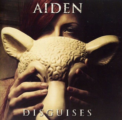 DISGUISES - CD